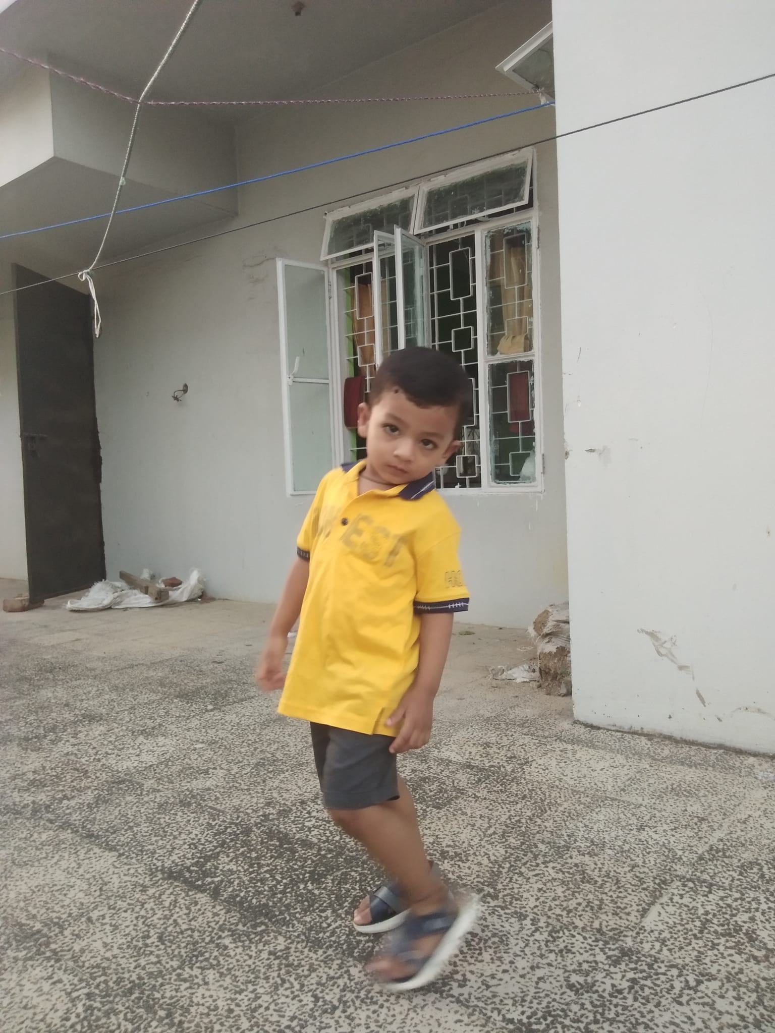 Shayan playing with toys